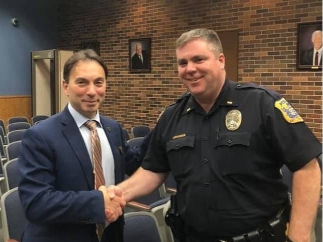East Brunswick Mayor Brad Cohen, left, with new Police Chief Frank LoSacco.