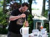 Scott Novick, 38, brewing beer in his Colts Neck backyard.