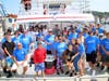Some of the kids and their families on the boat Monday at the dock in Atlantic Highlands.