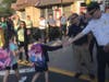Secaucus Police Chief Kevin Flaherty greets kids as they walked into Clarendon.