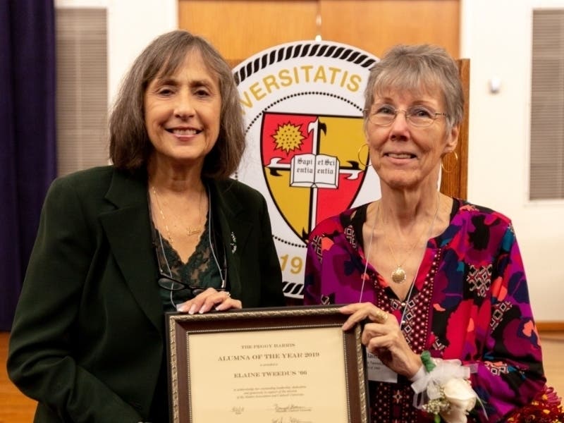 From left: Elaine Bauer Zabriskie, Caldwell University Alumni Board president, presents Elaine Tweedus, formerly of Woodbridge, with the Caldwell University 2019 Peggy Harris Alumna of the Year Award.