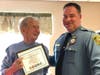 Veteran Don Ostler, 81, poses with Sergeant Christopher Stark of the Matawan police department on Veteran’s Day.