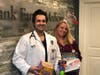Dr. Ryan Sahni and nurse practitioner Lexi Ruane with donations from 2018.