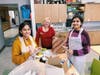 South Brunswick High students Amal Ali and Zoya Khurram assembling toothbrushes and toothpaste on Christmas Eve at the Trenton Area Soup Kitchen.