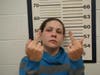 An Old Bridge woman was charged with breaking into cars, and her mugshot released by Spotswood police will likely go down as one of the greatest of all time.