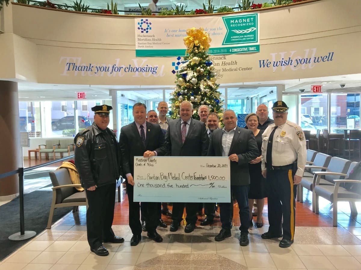 Middlesex County Association Chiefs of Police with Thomas Shanahan, chief hospital executive, Raritan Bay Medical Center, William DiStanislao, VP operations, Raritan Bay Medical Center and Linda Hill, executive director, Raritan Bay Medical Center.