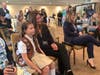 Brenna and her mom listen as Eileen Higgins, CEO, Girl Scouts of the Jersey Shore speaks at Salt Creek Grille in Rumson Tuesday.