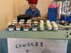 Little brother Max sold homemade candles.
