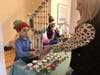 A group of five Nut Swamp students held a craft fair and bake sale at their home on Dec. 14 and invited the community.