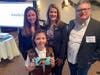 David Burke, at far right, with Assemblywoman Serena DiMaso and Belford's own Brenna McCormick, 8, who was chosen to appear on boxes of Girl Scout cookies nationwide this year.
