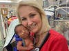 Today, McGowan, now 61, holds Caldwell's son, Zane, inside the St. Peter's NICU.