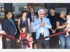 Yun at a ribbon cutting for a new business in the Jersey City Heights, where he owned Garden State News. Councilman Rolando Lavarro, who also had coronavirus, but is recovering, is at far left.