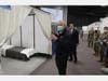Privacy is at a minimum inside the field hospital, as each small room is only separated by cloth fabric.