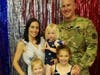 U.S. Army Major Matthew Zilinski with his wife Brie and their three daughters.