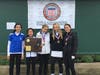 Claudia Zhang, holding the championship, pictured with the rest of the Holmdel High girls' varsity golf team when they won the Shore Conference title in 2018​ (for the second year in a row).