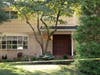 Yellow tape surrounds the crime scene Monday at the federal judge's private home in the Hidden Lakes development in North Brunswick. Her son was killed at the front door, said the FBI.