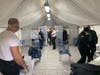This is what the waiting area inside the tent looks like. A trained EMT will be keeping an eye on those sitting. 