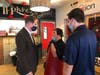 Mayor Tony Perry talks to an employee of No Limits Cafe