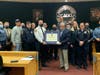 Announcing the accreditation at Tuesday night's Secaucus town Council meeting.
