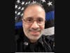 Newark Police Officer Hector Moya, who died of complications from COVID in January, at the age of 55.