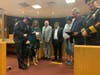 Handler Vincent DeFazio, his wife, Secaucus councilmen, Animal Shelter Director Chris Conte and Police Chief Dennis Miller with Strobe.