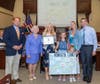 First-place winner, Mackenzie Miller of St. Leo the Great (L to R) Sheriff Shaun Golden, Surrogate Rosemarie Peters, County Clerk Christine Giordano Hanlon, Mackenzie Miller, sister Madison Miller, and parents Maureen & Doug Miller.