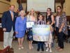 Third-place winner, Luke Farina of St. Jerome School (L to R) Sheriff Shaun Golden, Surrogate Rosemarie Peters, County Clerk Christine Giordano Hanlon, Luke Farina, sister Anna Farina, mother Nancy Farina and teacher Mrs. Janene Hubbard.