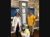 IMA Urgent Care’s Dr. Bhoori and office manager Angela with donations from IMA’s 2019 back-to-school drive.