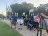 Pro-mask Middletown residents rallied on the sidewalk on Tindall Road.