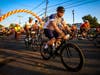 Riders in previous years cross the finish line in Huddy Park.