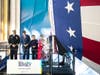 The ship’s sponsor, Dr. Susan DiMarco, wife of former Secretary of Homeland Security Jeh Johnson, breaks a bottle of American sparkling wine across the submarine’s bow.