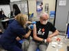 Gov. Phil Murphy getting a booster shot of the Pfizer vaccine.