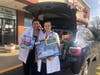 IMA Urgent Care Shrewsbury’s Dr. Ibrahim and physician assistant Alex helping to load up donations.