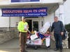 Middletown Helps Its Own volunteers Bobby and Brian helping to bring in donations.