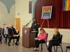 Woodbridge Police Department’s LGBTQ Liaison Officer Khari Manzini speaks before the crowd.