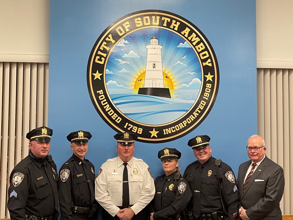 From left to right: Sgt. James Charmello Jr., Lieutenant Daniel Holovacko, Police Chief Darren LaVigne, Lieutenant Patricia Kanecke, Sgt. Steven Clark and Mayor Fred Henry.
