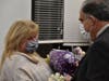 Ventura accepts roses from Aberdeen Mayor Fred Tagliarini.