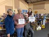 Middletown Helps Its Own volunteers Ann Cruz and Barbara Skrivanek along with IMA’s Dr. Roger Thompson and Alexis Thompson.