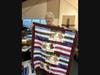 Middletown Helps Its Own’s Barbara Skrivanek with a handmade quilt donated by Middletown’s Rebecca’s Reel Quilt Guild.