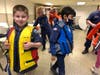 After the presentation from Oakley, the Coast Guard Auxillary taught Secaucus Boy Scouts about the importance of life jackets. 
