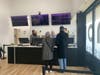 Customers purchase recreational-use marijuana Wednesday morning at Harmony.