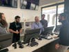 Brodchandel at the register with his employees. He says he employees 70 people at the Secaucus location alone, and has two more stores planned for Hoboken and Jersey City.