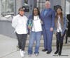 Zakiyyah Austin, second from left, at the opening of her Farmers Insurance Agency in downtown Woodbridge. She is pictured with her two teen daughters and Woodbridge Mayor John McCormac.