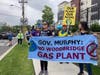 Photos of protesters who walked through the streets of Woodbridge Saturday. The protest started and ended at Woodbridge town hall.
