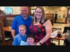 Eric Baumgartner, 39, with his wife, Anita, and their two sons. He has now been transferred to St. Barnabas, the state's most serious burn trauma center.