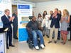 LeGrand, center, with Hackensack Meridian Health​ CEO Robert Garrett at far left.