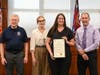 registered nurse Sarah Jastrzembski was also recognized for her life-saving work she has done as the nurse assigned to Woodbridge new mobile Health Dept. van.