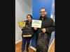 IMA Urgent Care of Middletown’s physician assistant Victoria and Dr. Soliman with donations.
