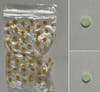Police say this single prescription Clonazepam pill, pictured front and back, was found in a bag of Halloween candy given to a child Tuesday night in Sayreville.