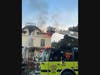 Woodbridge firefighters check for hotspots.